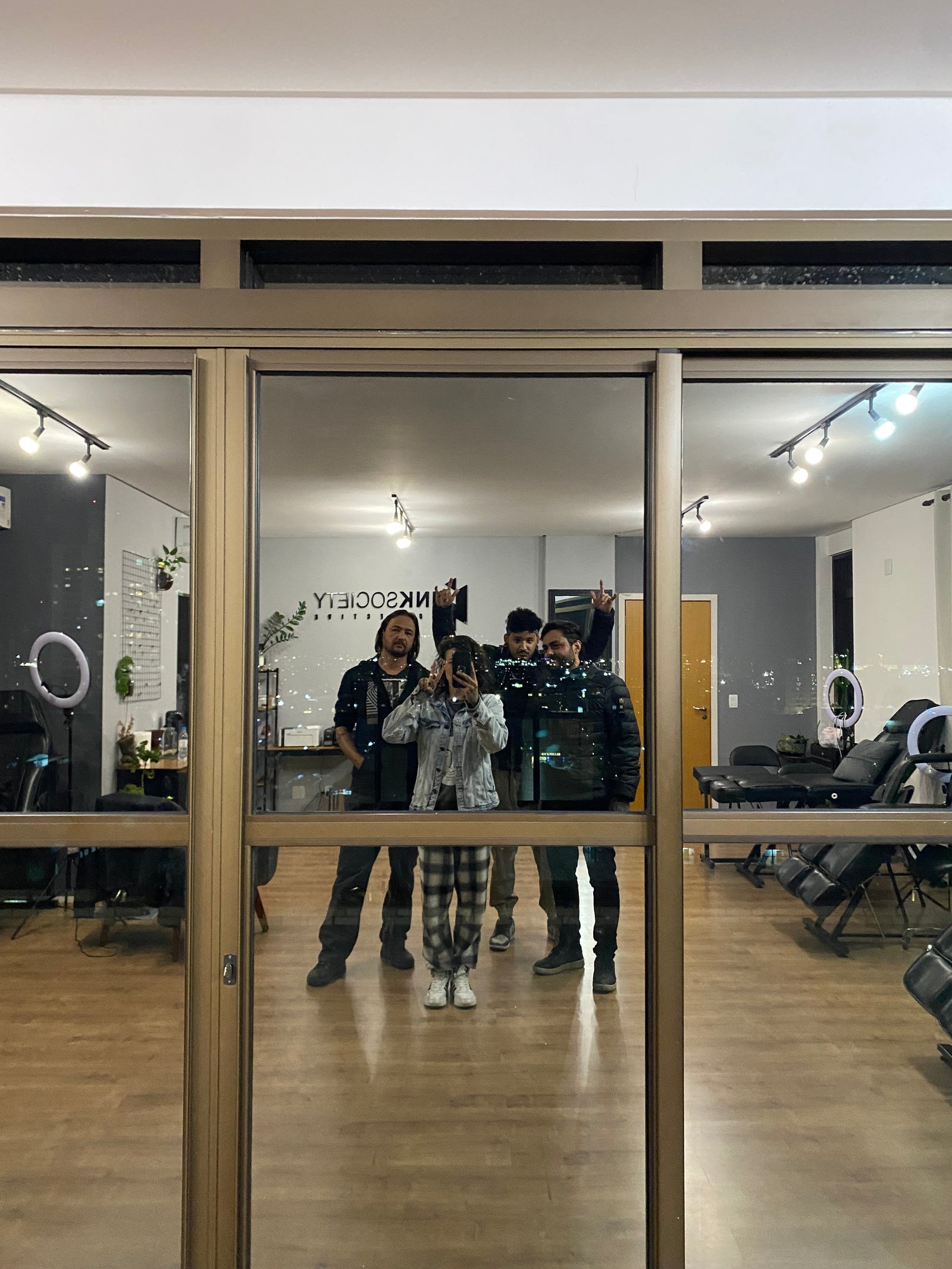 Lua working with artists at Ink Society 002, showing leadership, mentoring and shared knowledge.