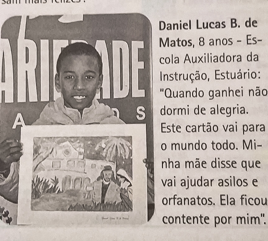 Newspaper clipping showing eight-year-old Daniel Lucas B. de Matos after winning a children’s drawing competition, an early sign of the artistic path that would later lead him to tattooing.