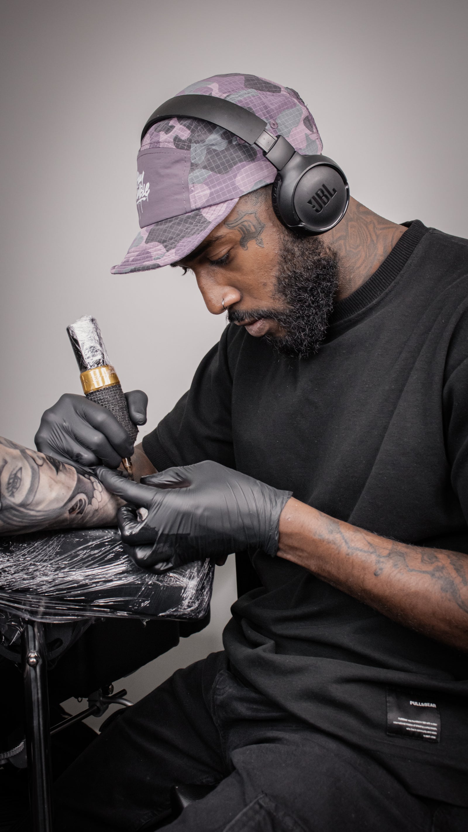 Daniel tattooing a client at Ink Society Collective Dublin.