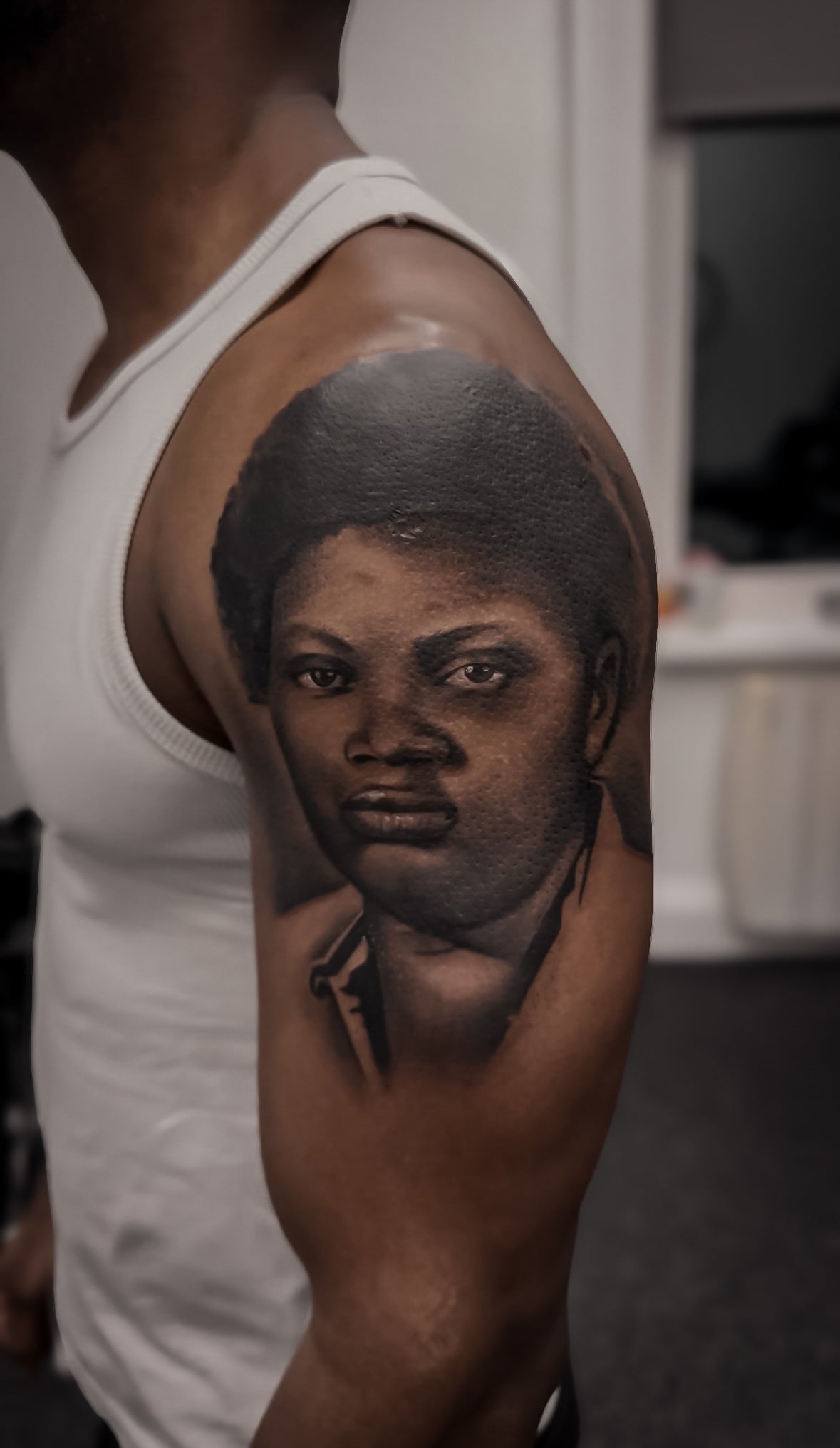Tattoo on Black skin by Daniel, showing clear contrast and readable structure.
